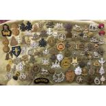 CIGAR BOX OF MISCELLANEOUS REGULAR ARMY REGIMENTAL BADGES AND INSIGNIA