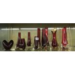 SHELF OF WHITEFRIARS AND OTHER RUBY COLOURED BUD AND SWUNG OUT VASES