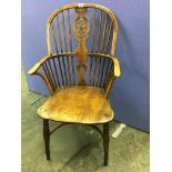 LATE 18TH/EARLY 19TH CENTURY YEW AND ELM WHEEL BACK WINDOSR ELBOW CHAIR WITH CRINOLENE STRTETCHER