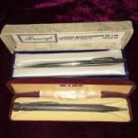 BOXED TRUSCRAFT PENCIL AND A STERLING SILVER YARD O' LEAD PROPELLING PENCIL