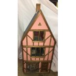 SCALE MODEL OF A JACOBEAN STYLE BEAMED DOLL'S HOUSE,