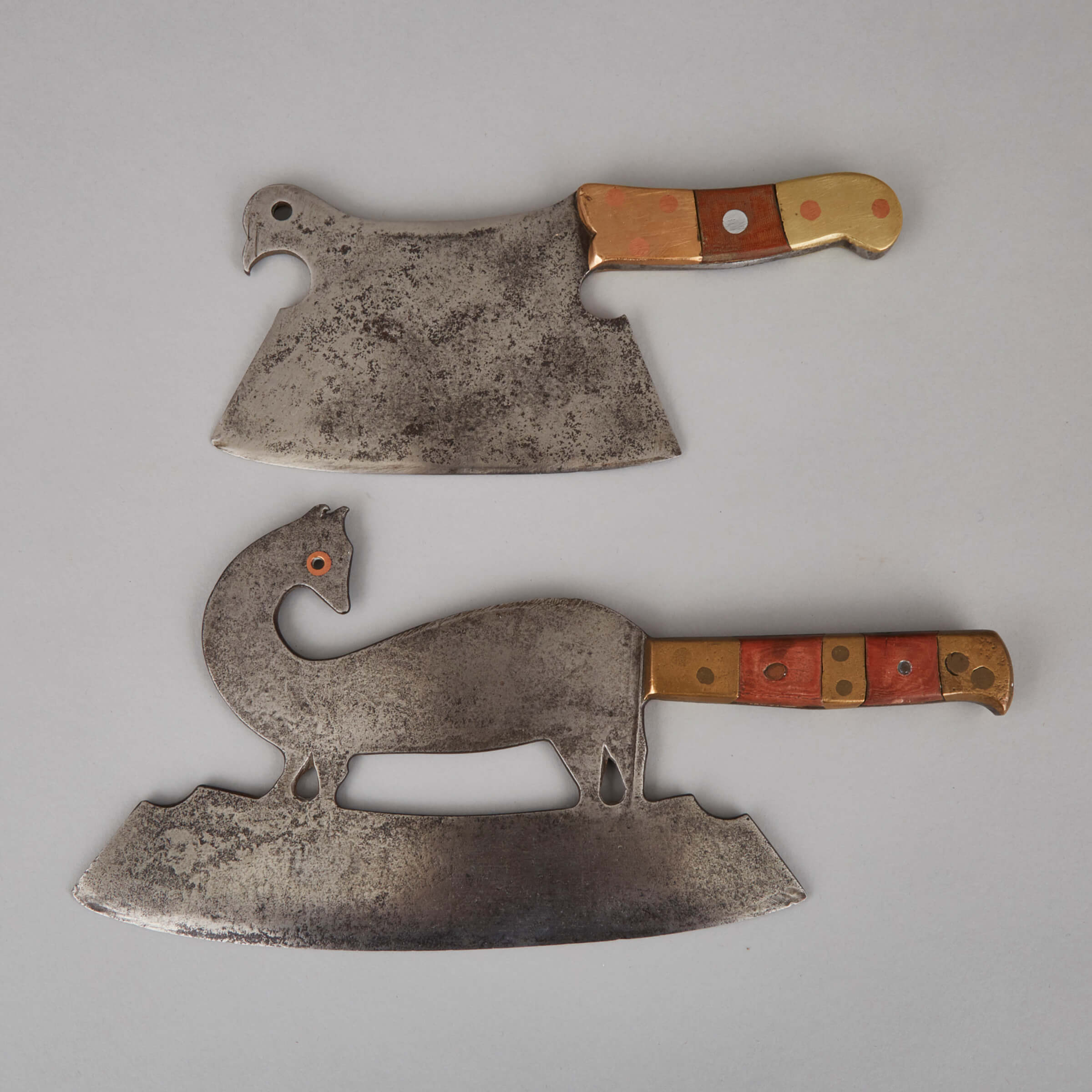 Two French Zoomorphic Iron Meat Cleavers, 19th century, diameter 12.25 in — 31.1 cm (2 Pieces)