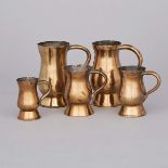Five Scottish Brass Baluster Measures, mid 19th century, half pint height 5 in — 12.7 cm (5 Pieces)