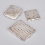 Two Continental Silver Cigarette Cases and a North American Compact, 20th century, 3.9 x 3 in — 10 x
