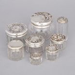 Eight North American Silver and Cut Glass Dressing Table Jars, c.1900-10, largest diameter 3.3 in —