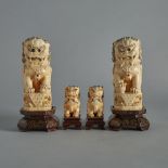 A Set of Four Ivory Carved Guardian Lions, Circa 1940, 約1940年 象牙雕福獅兩對一組四件, largest height 6 in — 15.