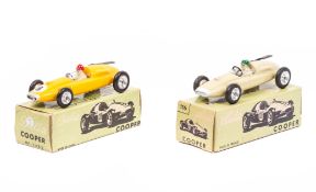2 scarce Solido/Dalia single seater racing cars. 2 Coopers. One in yellow, RN 8, driver with red