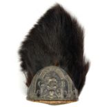 A 1768 pattern grenadier fur cap, red cloth back with white braid trim and tassels, blackened