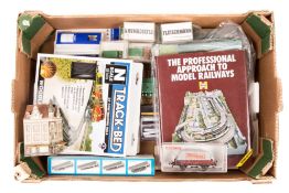 A good quantity of N gauge etc model railway accessories. Including plaster rock scenes, including