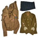 An ERII Q Master’s khaki jacket of The Black Watch, with insignia and pair tartan trews; 3 “