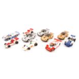 10x 1970s Scalextric racing cars. 4x Porsche 911 (2 in silver and 2 in bronze). 2x McLaren F1 in red