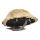 A good WWI Brodie's Patent steel helmet, with liner (patent stamp faint), leather chinstrap, and