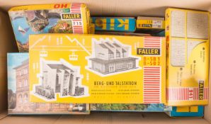 15 HO gauge railway lineside unmade plastic kit buildings and accessory packs by Faller and Kibri,