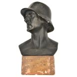 A large black painted plaster bust of a German soldier, this lot has been withdrawn