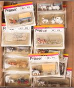 17 HO gauge railway lineside models of horses pulling carts by Preiser. Examples include cart horses