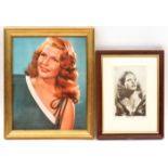 A postcard size signed photograph “Rita Heyworth”, head and shoulders, issued by Columbia Studios,