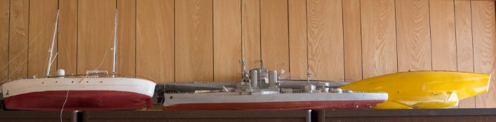 9 large scale model ships of various types. Including; a 3-funnel 19thC battleship (1400mm). A