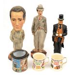 3 painted plaster figures: Charlie Chaplin, in typical baggy suit with bowler hat and cane, 17”,