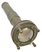 A diver’s cast brass torch, slender stem with screw on head, diam 3¼”, incorporating bullseye