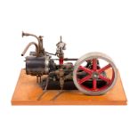 A Stuart Turner No.9 live steam mill engine. A single cylinder horizonal engine (cylinder