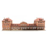 A small quantity of German HO gauge plastic lineside buildings. Including; Timber yard, Post Office,