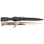 A Third Reich period parade bayonet, plated blade 10” by WKC, the plated hilt with birds head pommel