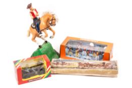 A small quantity of military vehicles and Wild West related figures by Britains, Crescent and