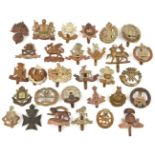 30 different infantry cap badges, including Queens without title, R Warwicks, Devon, Leicester, SWB,