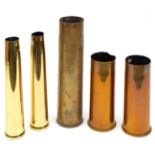 5 brass shell cases: WWI French 75mm (battered); 2 WWI German 75 mm; and 2 British 40mm, dated 1944.