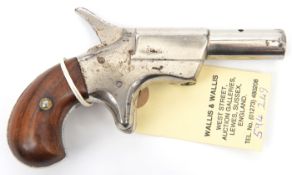 A Belgian 8.5mm RF Derringer pistol, 5” overall, barrel 2½” which swings to the right for loading,