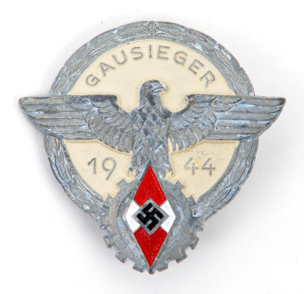 A scarce painted aluminium Hitler Youth Gausieger pinback badge, dated 1944, by G Brehmer,