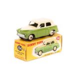 Dinky Toys Hillman Minx Saloon (154). A scarce example in cream and lime green, with cream wheels