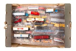 A quantity of HO gauge vehicles by Wiking. Examples include; articulated tankers with trailers,
