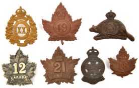 7 CEF infantry cap badges: 12th (12A, one lug missing), 14th, 18th (18A), 19th (19B), 20th (20B),