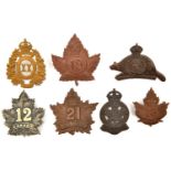 7 CEF infantry cap badges: 12th (12A, one lug missing), 14th, 18th (18A), 19th (19B), 20th (20B),