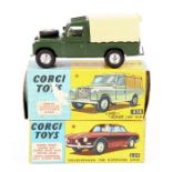 A Corgi Toys Land Rover (109" W.B.). An example in dark green with yellow interior and with cream