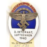 A Third Reich NSFK large oval enamelled badge, the centre with silvered Icarus device, above which