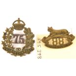 An officer’s cap badge of the 75th Lunenburg Regt, and a collar of the 88th Regt (Victoria Fus)