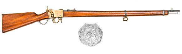 A well engineered non working miniature model of a Martini type rifle, 7¾” overall, with bronze