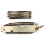 A WWI clasp knife, by Thomas Turner & Co Sheffield, with blade, spike and can opener, WM grips
