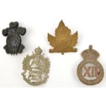 4 Militia cap badges: brass 12th York Rangers, blackened 14th Princess of Wales’s Own Rifles, WM