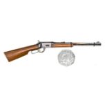 A well engineered non working miniature model of an 1876 Winchester carbine, 6” overall, with