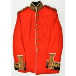 A Lieutenant General’s full dress scarlet tunic, blue facings, gilt oak wreath embroidery to collar,