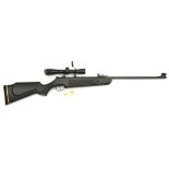A .22” SMK “SYNX5” break action air rifle, no visible number, the matt black plastic stock having