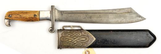 A Third Reich RAD man’s hewer, blade marked “Carl Eickhorn Solingen” etc staghorn grips, in its