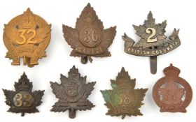 7 CEF infantry cap badges: 27th, 30th (30B) and 32nd all with slides, 33rd (33B), 36 with slide (