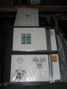 Another lot of stamps and First Day covers, including 2 folders of Channel Islands, stamps and