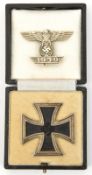 A Third Reich Iron Cross 1st Class, in its fitted case, also a bar to the Iron Cross. GC