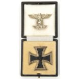 A Third Reich Iron Cross 1st Class, in its fitted case, also a bar to the Iron Cross. GC