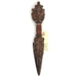 An interesting 19th century Tibetan carved and polished all darkwood exorcising dagger phurbu,